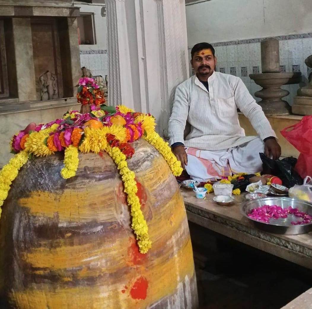 Priest performing traditional puja